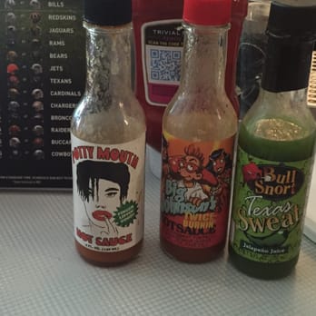 Bonnie's Grill - just a few of the many funny/interesting hot sauces at Bonnie's - Chicken Wings Near Me - Brooklyn, New York Bonnie's Grill - just a few of the many funny/interesting hot sauces at Bonnie's - Chicken Wings Near Me - Brooklyn, New York