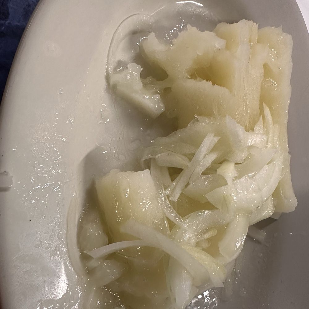 Latin Cafe - Cassava and onions. Not sure how they cooked this but I NEED the recipe!! - Cuban Near Me - Miami Beach, Florida Latin Cafe - Cassava and onions. Not sure how they cooked this but I NEED the recipe!! - Cuban Near Me - Miami Beach, Florida