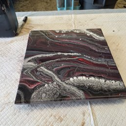 My dad took me to this cool experience where I created this piece of art and I thought this was a great experience and it was fun to do.