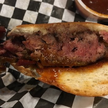 The Garage - Definitely way less than medium. Not just pink but bright reddish pink and super moist as if it were raw uncooked ground beef. - Burgers Near Me - Kenosha, Wisconsin