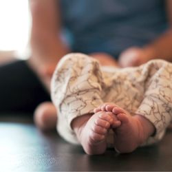 BoDo Chiropractic - Dr. Kyle performing a newborn adjustment.