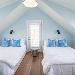 Ackceptional Luxury Nantucket Rentals - One of the bedrooms in the Millie cottage.