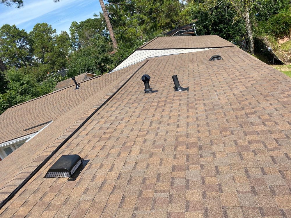 Slide of Precision Roofing