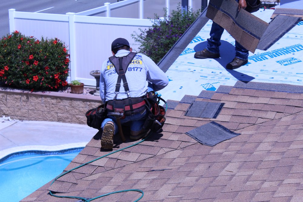 Slide of Dana Logsdon Roofing & Solar