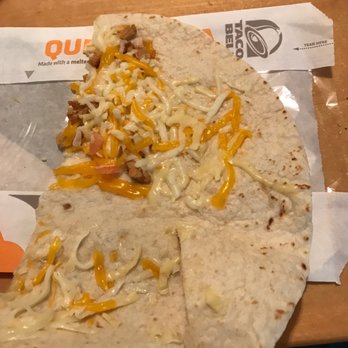 Taco Bell - You can see the tomatoes in my boyfriends quesadilla - Fast Food Near Me - Fort Myers, Florida