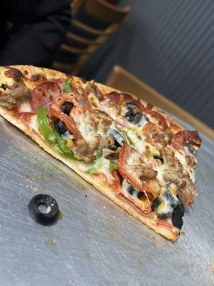 Extreme Pizza - Novato Logo