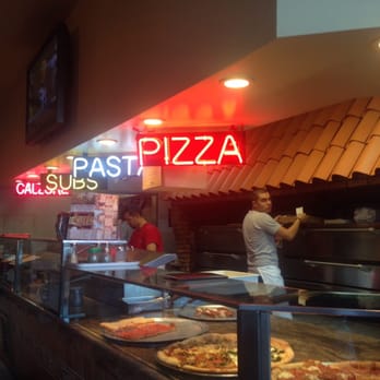 Frank's Pizza of Pompton Lakes - Counter and pizza oven in background - Pizza Near Me - Pompton Lakes, New Jersey Frank's Pizza of Pompton Lakes - Counter and pizza oven in background - Pizza Near Me - Pompton Lakes, New Jersey