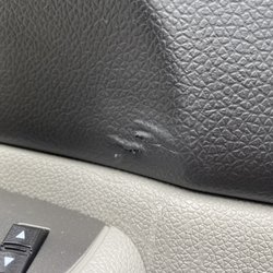 Pharoah Auto Detail & Accessories - Rip in my interior door panel after they realized they blew the lock switches from washing my truck with the door not closed all the way