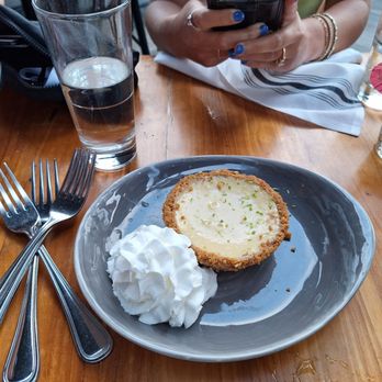 Duke's La Jolla - Key lime pie & whipped cream for dessert. Able to split between 4 people - great sweet treat! - New American Near Me - La Jolla, California