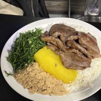 Sergio's Restaurant and Burger - Picanha (top round steak with cap on) with yucca, collard greens, rice, and "farofa," based on cassava flour. - Burgers Near Me - Long Branch, New Jersey