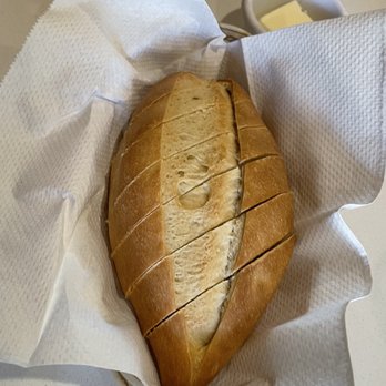 La Ciccia - Yummy loaf of bread is served hot from the oven with soft butter - Italian Near Me - Honolulu, Hawaii La Ciccia - Yummy loaf of bread is served hot from the oven with soft butter - Italian Near Me - Honolulu, Hawaii