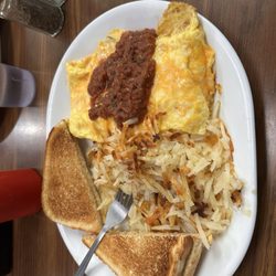 Buddy's Family Diner - Spanish omelet, very good. Came the toast of choice, jelly and a pile of hashbrowns. The salsa on top of the omelet was tasty too.