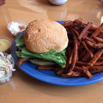 The Original Margaritaville - Perch sandwich and sweet potato fries. - Desserts Near Me - Sandusky, Ohio The Original Margaritaville - Perch sandwich and sweet potato fries. - Desserts Near Me - Sandusky, Ohio