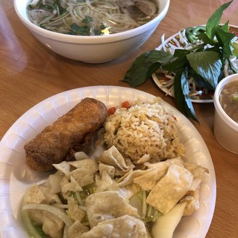 Egg Roll Number 1 - Chow Mein/egg roll lunch combo in front and meat ball pho in the back. Both delicious - Vietnamese Near Me - Indianapolis, Indiana Egg Roll Number 1 - Chow Mein/egg roll lunch combo in front and meat ball pho in the back. Both delicious - Vietnamese Near Me - Indianapolis, Indiana