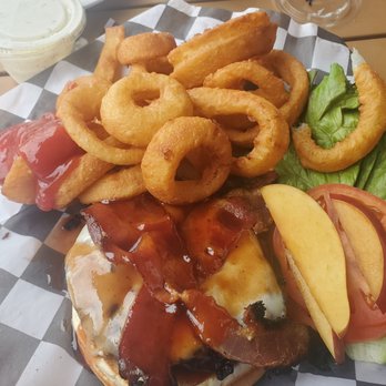 Mulligan's Irish Pub - a burger with onion rings - Pubs Near Me - Barre, Vermont