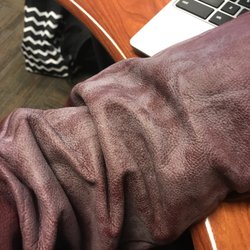 Trophy Cleaners - Leather sleeves ruined on varsity jacket