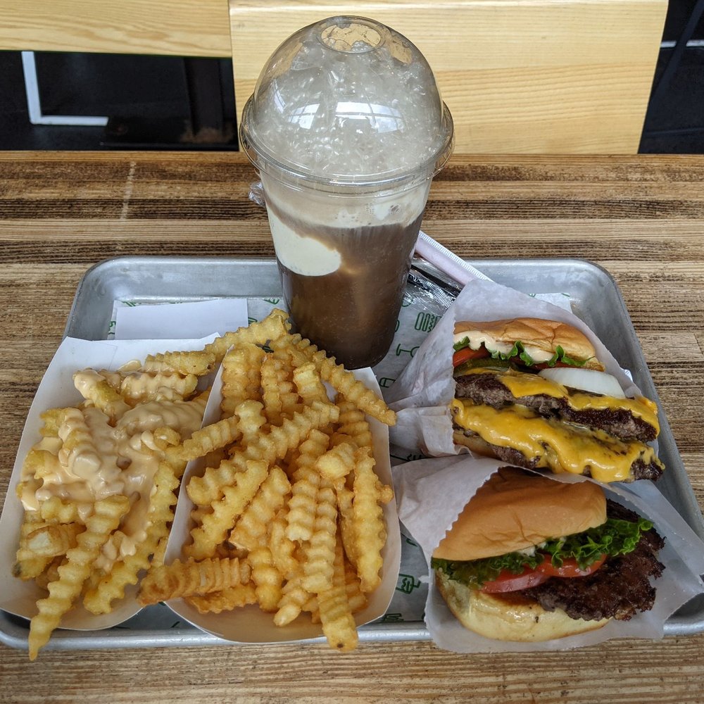 Shake Shack Lexington - From left to right: cheese fries, regular fries, root beer float, double patty shack burger, single shack burger without cheese. - Fast Food Near Me - Lexington, Kentucky Shake Shack Lexington - From left to right: cheese fries, regular fries, root beer float, double patty shack burger, single shack burger without cheese. - Fast Food Near Me - Lexington, Kentucky