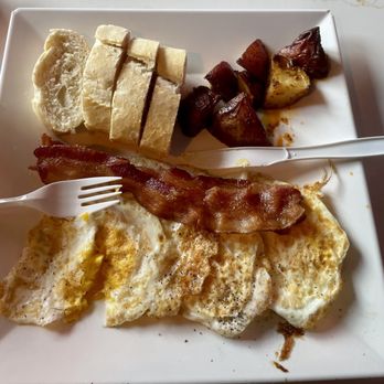 Cafe Papillon - Disgusting! Over cooked eggs, cold, bacon, and a few cold potatoes ...dry bread - Coffee & Tea Near Me - Miami, Florida