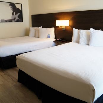 Steam Plant Hotel - Interior of double queen bed room at Steam Plant Hotel Spokane - Hotels Near Me - Spokane, Washington Steam Plant Hotel - Interior of double queen bed room at Steam Plant Hotel Spokane - Hotels Near Me - Spokane, Washington