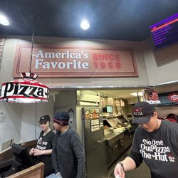 Pizza Hut - Right female was our cashier.