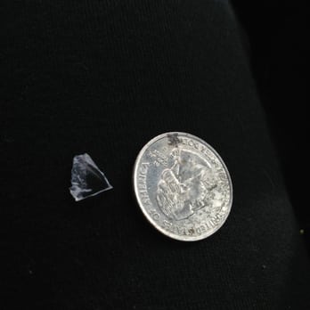 BAMBU - Small piece of plastic found while drinking my drink. Quarter for size comparison. - Juice Bars & Smoothies Near Me - San Francisco, California