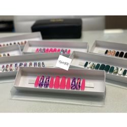 The NailHER - Custom fitted press on sets available. Made-to-order. Visit our website for a sizing kit and to place an order.