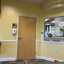 Tampa Bay Regional Surgery Center - Reception window and one restroom