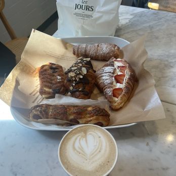 Tous Les Jours - Lavender Latte, Garlic Sausage Block, Blueberry Cream Cheese, Chocolate Croissant, Strawberry Cream Croissant, and Milk Cream Cornet Pie - Coffee & Tea Near Me - Charlotte, North Carolina Tous Les Jours - Lavender Latte, Garlic Sausage Block, Blueberry Cream Cheese, Chocolate Croissant, Strawberry Cream Croissant, and Milk Cream Cornet Pie - Coffee & Tea Near Me - Charlotte, North Carolina