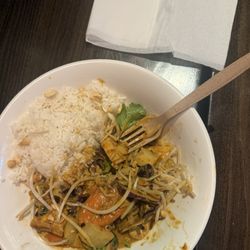 Spicy peanut noodle box with chicken and rice. Hot.