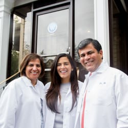 Wellesley Dental Group - Drs. Ali and Ali with their daughter and newest associate, Dr. Zarah Ali