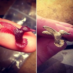 Two Birds Jewelers - Custom Humming Bird pendant. Wax carving on left and gold casting on right.