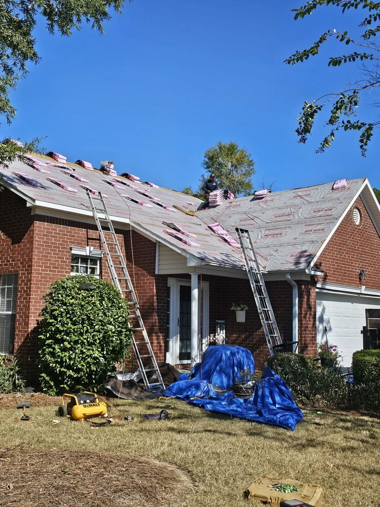 Slide of Amazing Roofing Team