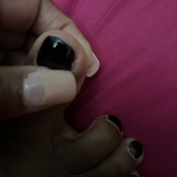 Lavender Nails & Spa - Thumb and big toe with cuts.