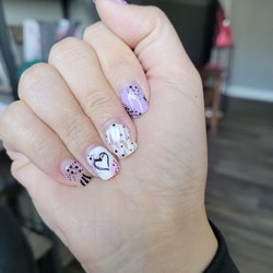 Polished Nails and Spa - These are about 2 weeks old already  (sorry didn't have a new picture!) But just the design itself is beautiful and intricate.