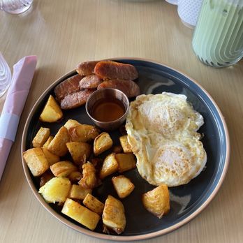 Breezy - Easy breezy special with Country Potatoes, over easy eggs, and Longanisa (Sweet Sausage) served with vinegar - Breakfast & Brunch Near Me - San Juan Capistrano, California