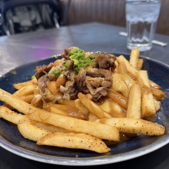 Eggspectation - Nashville - Duck Confit Poutine- so good! - American Near Me - Nashville, Tennessee