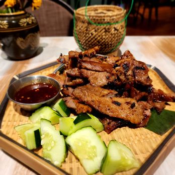 Padaek - Arlington - NAM TOK Grilled NY steak, spicy toasted rice sauce, cilantro, mint. Side sticky rice - Laotian Near Me - Arlington, Virginia Padaek - Arlington - NAM TOK Grilled NY steak, spicy toasted rice sauce, cilantro, mint. Side sticky rice - Laotian Near Me - Arlington, Virginia