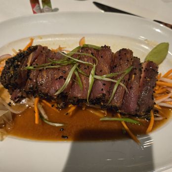 Mastro's Steakhouse - Seared tuna over a bed of carrots and radishes - Steakhouses Near Me - Costa Mesa, California Mastro's Steakhouse - Seared tuna over a bed of carrots and radishes - Steakhouses Near Me - Costa Mesa, California