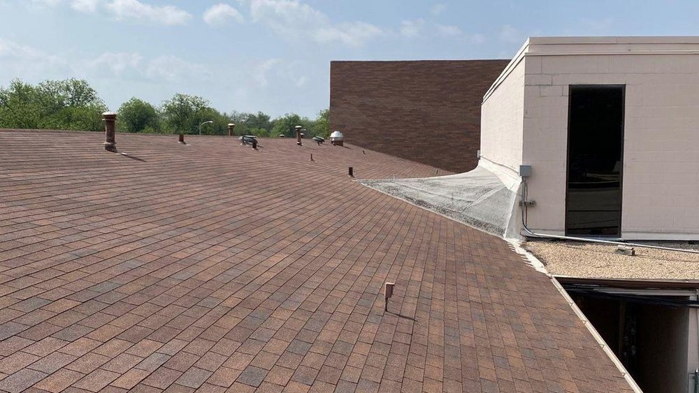 Slide of Thornton’s Roofing Company