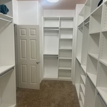 Conquering Clutter Closets & Cabinetry - Master walk in closet - Cabinetry Near Me