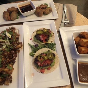 Pure Kitchen Elgin - To the left - cauliflower app (out of this world), middle - tacos, right - tofu app, back - dumplings. - Vegetarian Near Me - Ottawa, Ontario