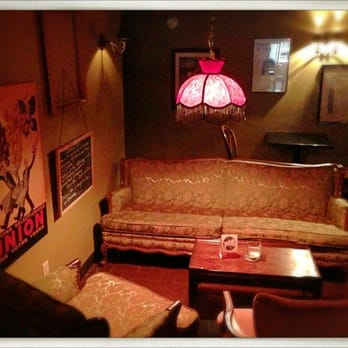 Vermouth - a living room with a couch and a lamp - Bars Near Me - Windsor, Ontario Vermouth - a living room with a couch and a lamp - Bars Near Me - Windsor, Ontario