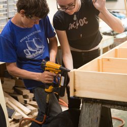 New England Youth Theatre - Young apprentices building a set.