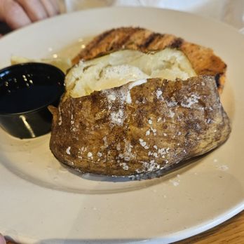 Logan's Roadhouse - Salmon dinner with baked potato - Steakhouses Near Me - North Myrtle Beach, South Carolina