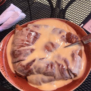 Sundance Grill - $5 cinnamon roll the size of my head! Tastes more like a cinnamon bagel than cinnamon roll though... - Breakfast & Brunch Near Me - Cascade, Michigan Sundance Grill - $5 cinnamon roll the size of my head! Tastes more like a cinnamon bagel than cinnamon roll though... - Breakfast & Brunch Near Me - Cascade, Michigan