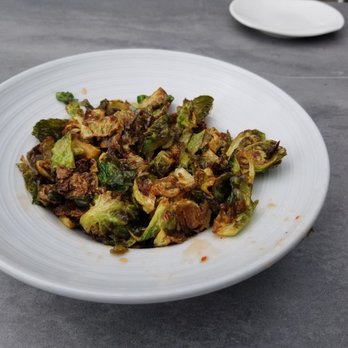 Field & Tides - Brussells with a chili honey glaze. - Southern Near Me - Houston, Texas Field & Tides - Brussells with a chili honey glaze. - Southern Near Me - Houston, Texas