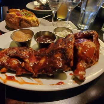 Wildfire - Half barbecue ribs and chicken. Both were so tender. DELICIOUS - Steakhouses Near Me - Oak Brook, Illinois