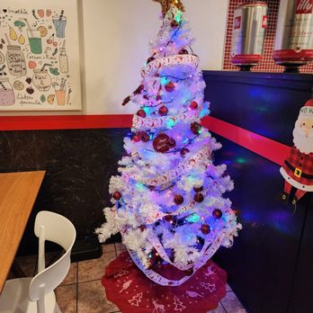 Liquid Fusion Cafe - a white christmas tree with blue lights - Coffee & Tea Near Me - Northbrook, Illinois