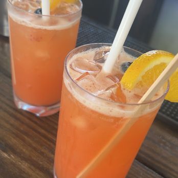 Casa Isleña Inn - Passion fruit, orange juice, pineapple, and watermelon vodka drinks. - Hotels Near Me - Rincón, Puerto Rico