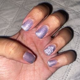 Gel Manicure, cat eye polish and flower design Gel Manicure, cat eye polish and flower design